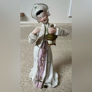 Ceramic figurines, made in Japan, passed down from mom. Best guess age is 67 yrs